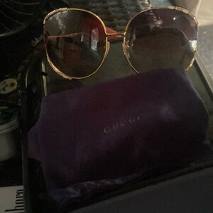 Pair of lightly used Gucci sunglasses w bag and case great condition